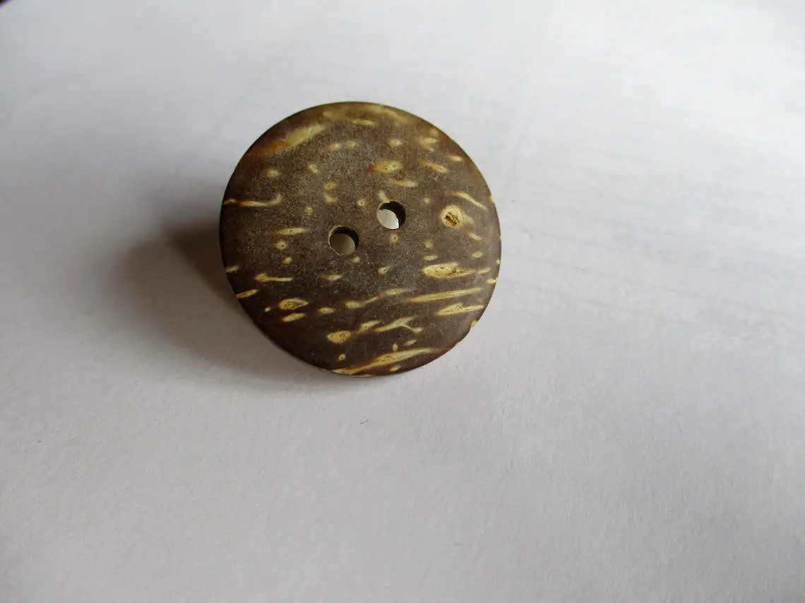 How To Sew On a Button With 2 Holes